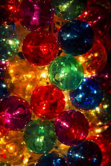 A Stack Of Colorful Illuminated Christmas Ornaments Photographic A Stack of Colorful Illuminated Christmas Ornaments Photographic Print by Stephen St. John | Art.com - A Stack Of Colorful Illuminated Christmas Ornaments Photographic