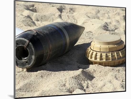 A Static Display of a Converted Ordnance Shell and a Simple Mine-Stocktrek Images-Mounted Photographic Print
