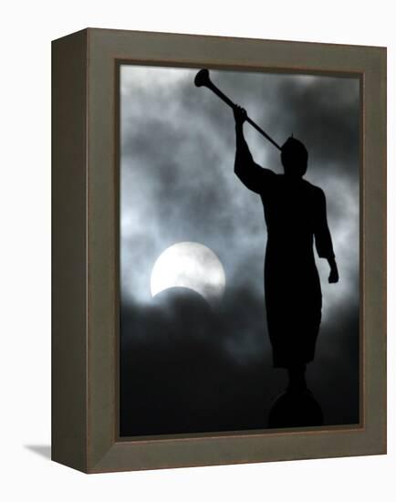 A Statue is Seen against a Cloudy Sky and a Partial Solar Eclipse-null-Framed Premier Image Canvas