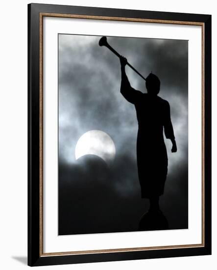 A Statue is Seen against a Cloudy Sky and a Partial Solar Eclipse-null-Framed Photographic Print
