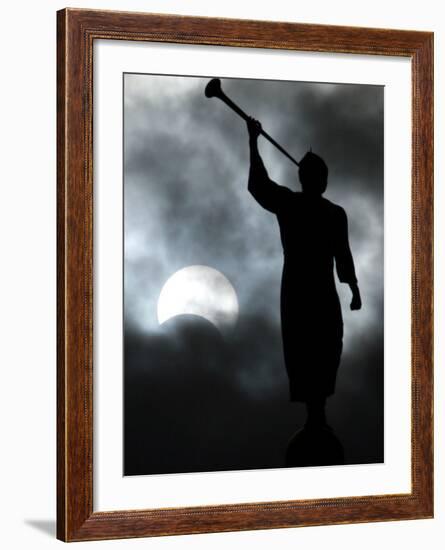 A Statue is Seen against a Cloudy Sky and a Partial Solar Eclipse-null-Framed Photographic Print