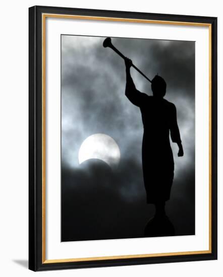 A Statue is Seen against a Cloudy Sky and a Partial Solar Eclipse-null-Framed Photographic Print