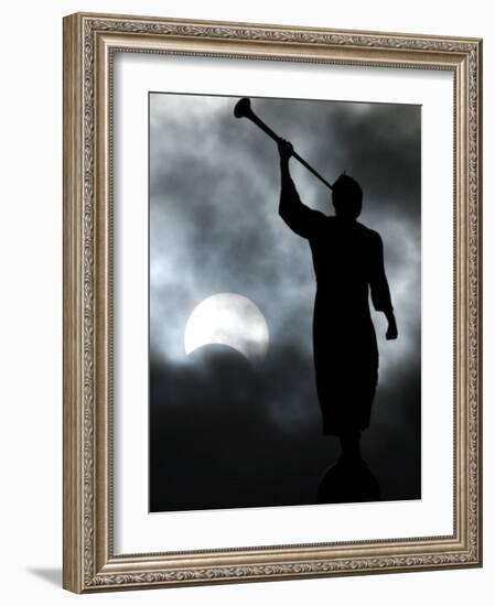 A Statue is Seen against a Cloudy Sky and a Partial Solar Eclipse-null-Framed Photographic Print