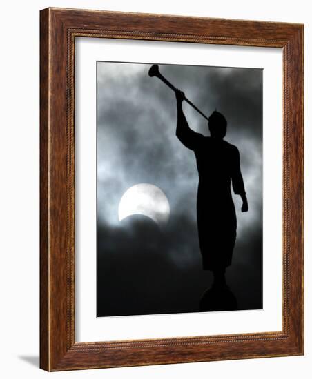 A Statue is Seen against a Cloudy Sky and a Partial Solar Eclipse-null-Framed Photographic Print