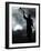 A Statue is Seen against a Cloudy Sky and a Partial Solar Eclipse-null-Framed Photographic Print