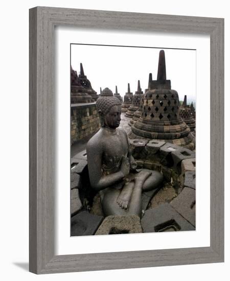 A Statue of Buddha Sits on a Terrace-Dita Alangkara-Framed Photographic Print