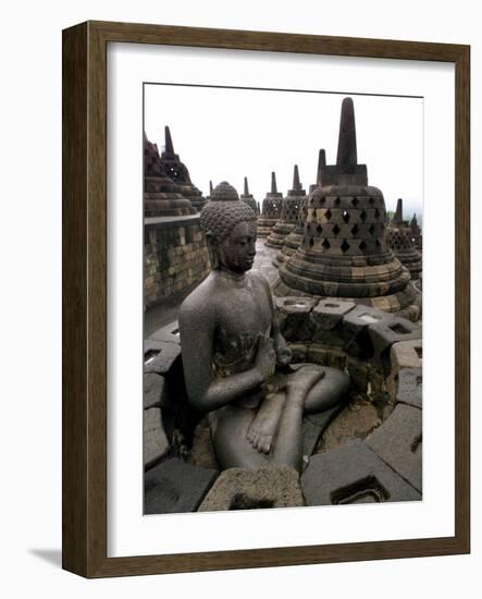 A Statue of Buddha Sits on a Terrace-Dita Alangkara-Framed Photographic Print
