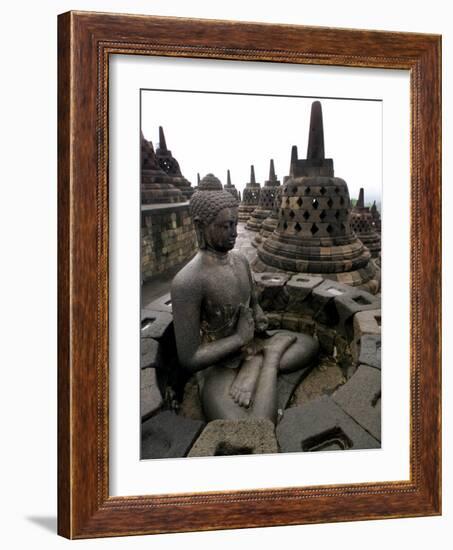 A Statue of Buddha Sits on a Terrace-Dita Alangkara-Framed Photographic Print