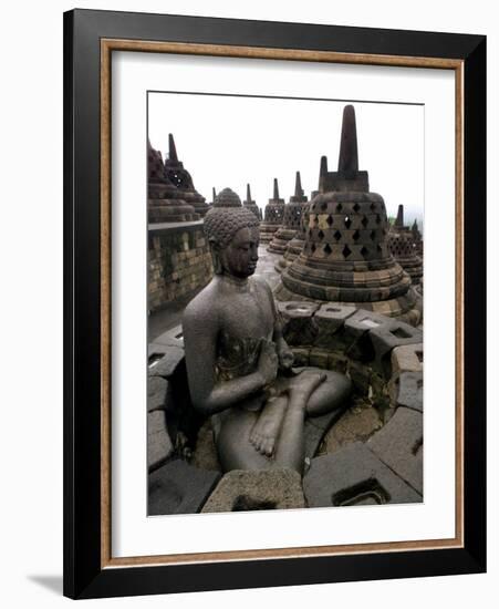 A Statue of Buddha Sits on a Terrace-Dita Alangkara-Framed Photographic Print