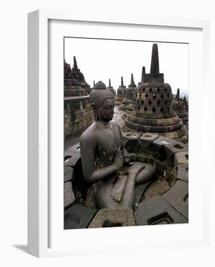 A Statue of Buddha Sits on a Terrace-Dita Alangkara-Framed Photographic Print