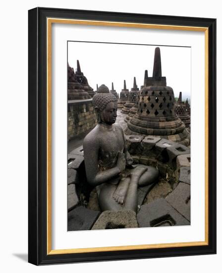 A Statue of Buddha Sits on a Terrace-Dita Alangkara-Framed Photographic Print