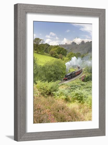 A steam locomotive approaching Goathland from Grosmont in September 2016, North Yorkshire, England-John Potter-Framed Photographic Print