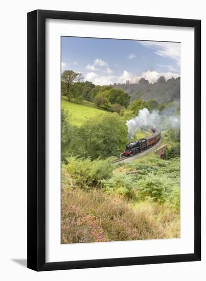 A steam locomotive approaching Goathland from Grosmont in September 2016, North Yorkshire, England-John Potter-Framed Photographic Print