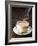 A Steaming Cup of Coffee on Coffee Beans-Peter Sapper-Framed Photographic Print