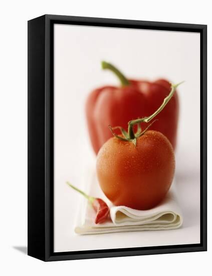 A Still Life Featuring a Red Pepper, a Tomato and a Red Chilli-Michael Wissing-Framed Premier Image Canvas