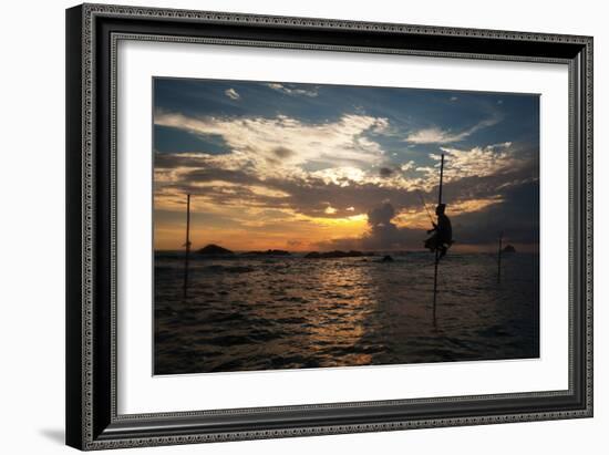 A Stilt Fisherman at Sunset-Alex Saberi-Framed Photographic Print