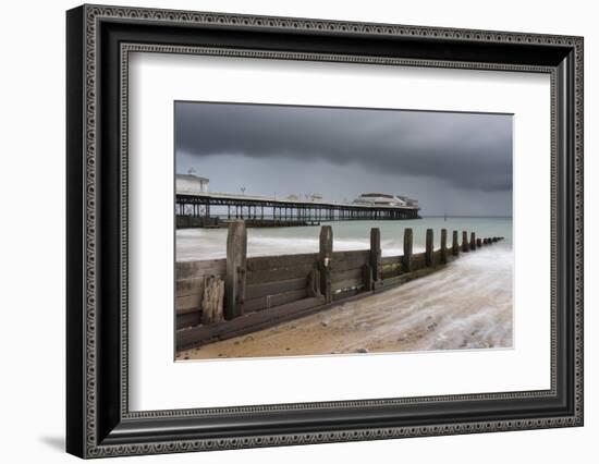 A stormy sky over the beach and pier at Cromer, Norfolk, England, United Kingdom, Europe-Jon Gibbs-Framed Photographic Print