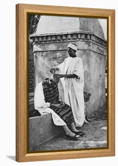 A Street Barber and His Client, Algeria, Africa, 1922-Donald Mcleish-Framed Premier Image Canvas