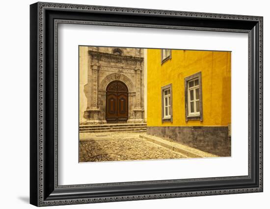 A Street in Tavira Leading to the Entrance of a Church.-Julianne Eggers-Framed Photographic Print