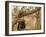 A Sudanese Girl Plays Inside a Thatched Hut at the Refugee Camp of Zamzam-null-Framed Photographic Print