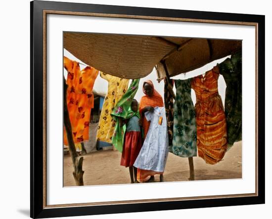 A Sudanese Woman Buys a Dress for Her Daughter at the Zamzam Refugee Camp-null-Framed Photographic Print