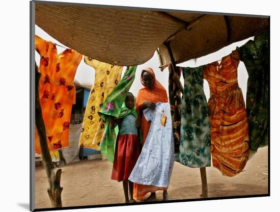 A Sudanese Woman Buys a Dress for Her Daughter at the Zamzam Refugee Camp-null-Mounted Photographic Print