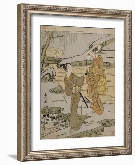 A Summer Scene on a Raised Embankment of a Young Man Cutting an Aubergine to Give to His Young…-Suzuki Harunobu-Framed Giclee Print