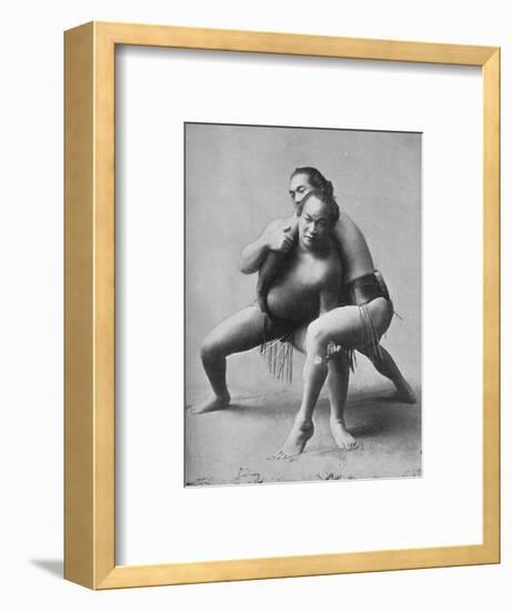 A sumo wrestling bout between a pair of Japanese professionals, 1902-Unknown-Framed Photographic Print