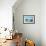 A Sunny Living Room Interior-PlusONE-Framed Photographic Print displayed on a wall