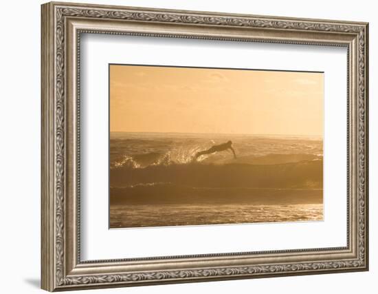 A Surfer Dives over a Wave on Praia Da Joaquina Beach on Florianopolis Island-Alex Saberi-Framed Photographic Print