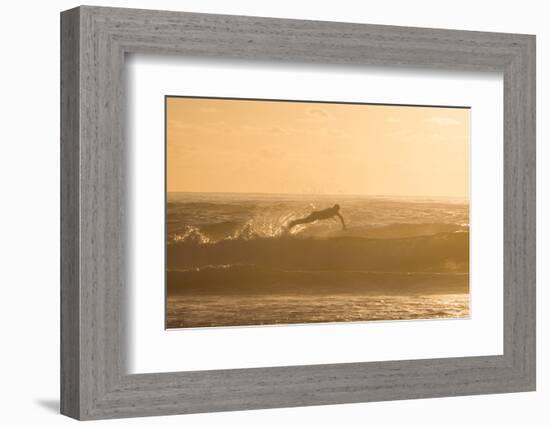 A Surfer Dives over a Wave on Praia Da Joaquina Beach on Florianopolis Island-Alex Saberi-Framed Photographic Print