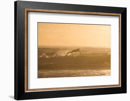 A Surfer Dives over a Wave on Praia Da Joaquina Beach on Florianopolis Island-Alex Saberi-Framed Photographic Print