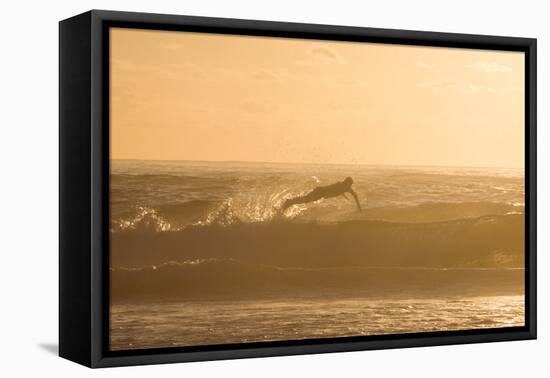 A Surfer Dives over a Wave on Praia Da Joaquina Beach on Florianopolis Island-Alex Saberi-Framed Premier Image Canvas