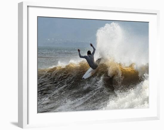 A Surfer Takes The Top Of A Wave In Santa Barbara, Ca-Daniel Kuras-Framed Photographic Print