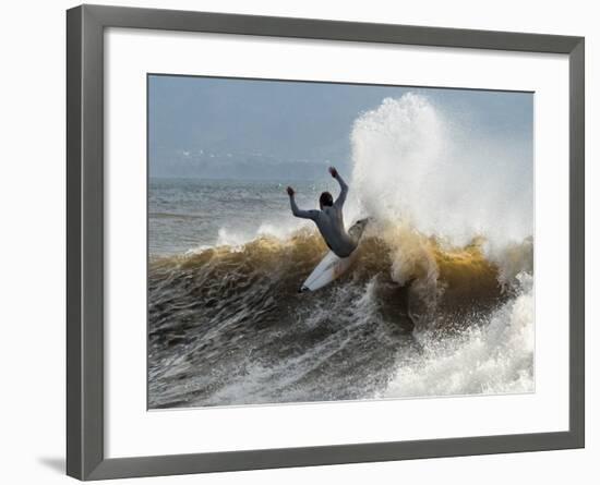 A Surfer Takes The Top Of A Wave In Santa Barbara, Ca-Daniel Kuras-Framed Photographic Print