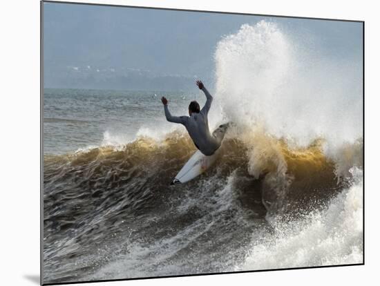 A Surfer Takes The Top Of A Wave In Santa Barbara, Ca-Daniel Kuras-Mounted Photographic Print