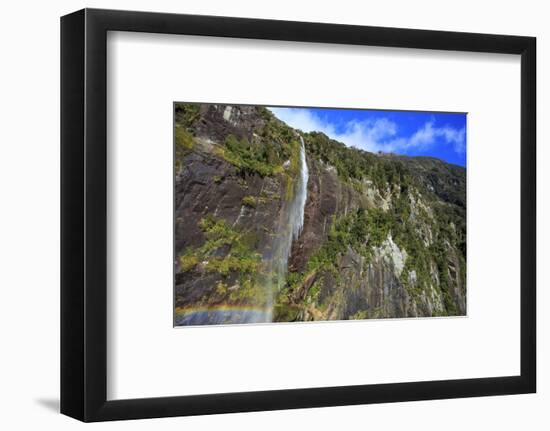 A Tall Waterfall Drops Off a Steep Cliff into Waters, Milford Sound on South Island, New Zealand-Paul Dymond-Framed Photographic Print