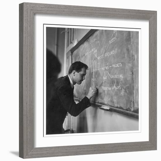 A Teacher Writing on a Blackboard at Northfield House Junior School, Leicester-Henry Grant-Framed Photographic Print