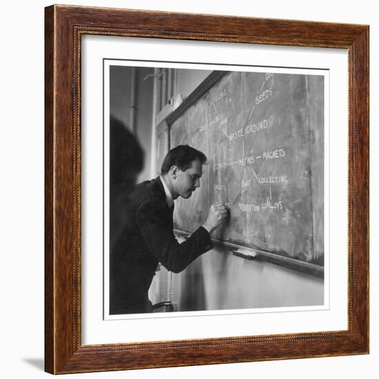 A Teacher Writing on a Blackboard at Northfield House Junior School, Leicester-Henry Grant-Framed Photographic Print