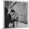 A Teacher Writing on a Blackboard at Northfield House Junior School, Leicester-Henry Grant-Mounted Photographic Print