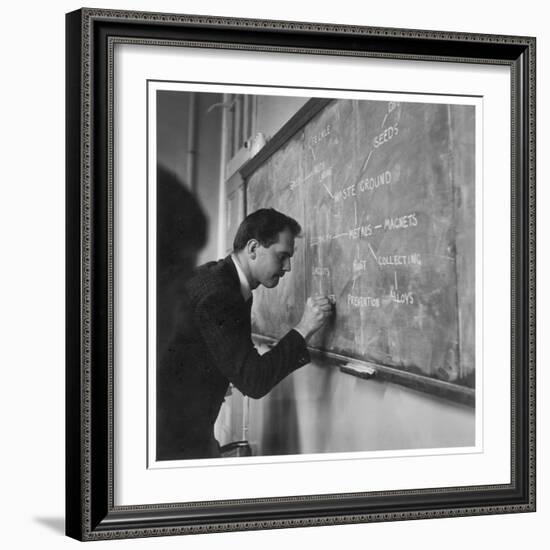 A Teacher Writing on a Blackboard at Northfield House Junior School, Leicester-Henry Grant-Framed Photographic Print