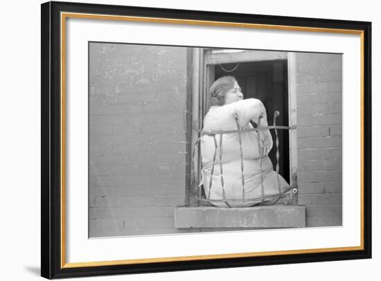 A tenant on 61st Street, between 1st and 3rd Avenues, New York City, 1938-Walker Evans-Framed Photographic Print