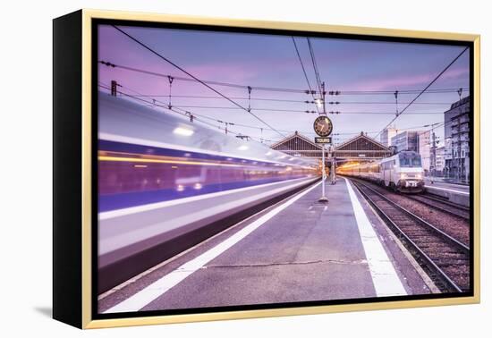 A TGV high speed train leaves the train station in Tours, Indre et Loire, Centre, France, Europe-Julian Elliott-Framed Premier Image Canvas