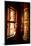 A Tibetan woman stands next to a large prayer wheel of the temple of Boudhanath Stupa, Kathmandu, N-Julian Bound-Mounted Photographic Print