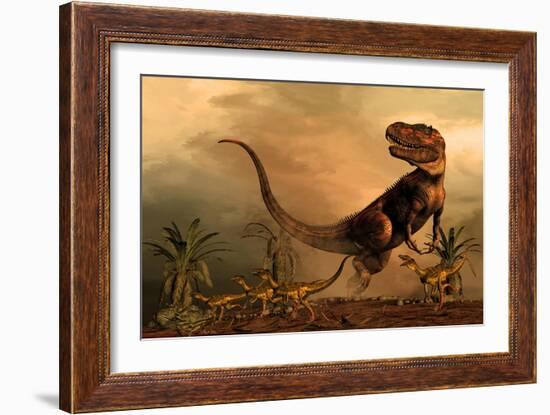 A Torvosaurus on the Prowl While a Group of Ornitholestes Flee a Hasty Retreat-null-Framed Art Print