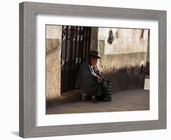 A Traditional Bolivian Woman Sits on a Doorstep in Potosi at Sunset-Alex Saberi-Framed Photographic Print