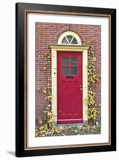 A Traditional Doorway in Autumn Colours, Old Town Utrecht, Netherlands-Julian Castle-Framed Photo