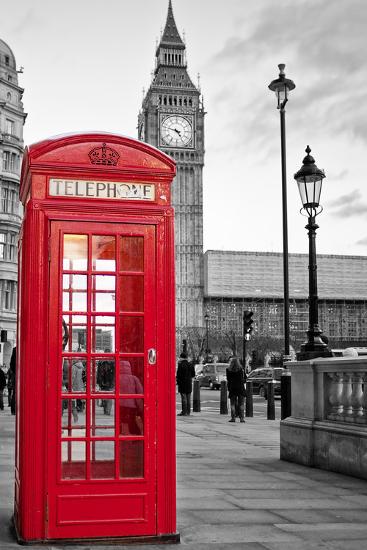 a traditional red phone booth in london with the big ben in a black and white background by kamira