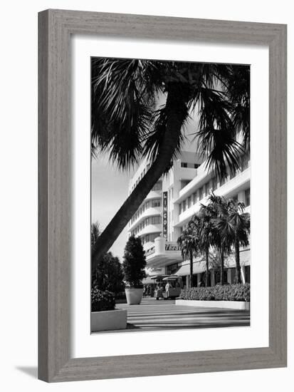 A Tram Carries Shoppers Past the Lincoln Theater, April 1969-null-Framed Photographic Print