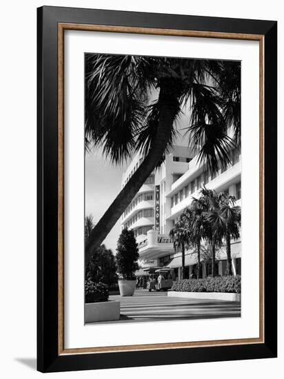 A Tram Carries Shoppers Past the Lincoln Theater, April 1969-null-Framed Photographic Print